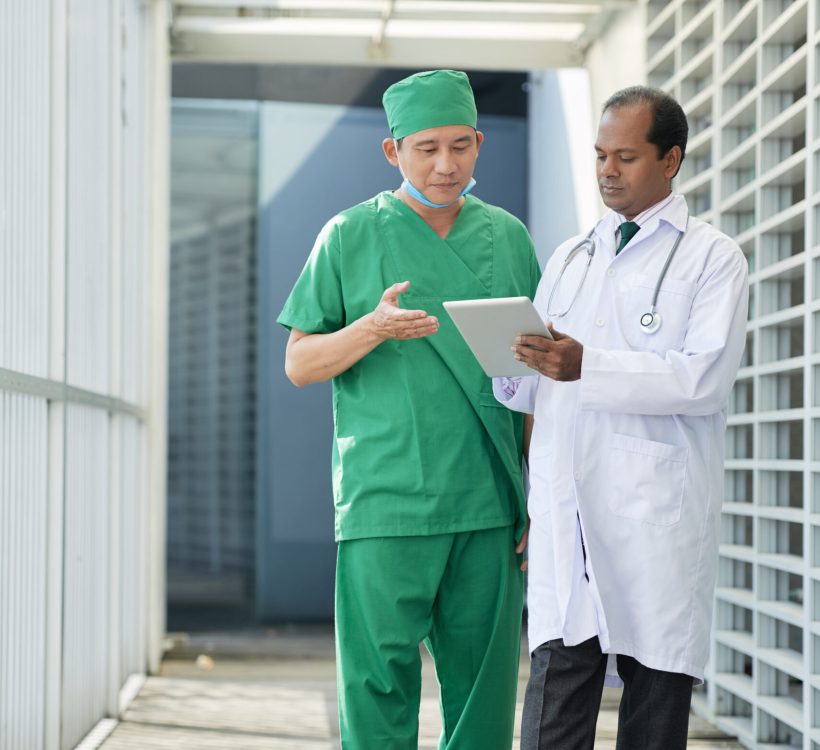 doctor and medical nurse talking